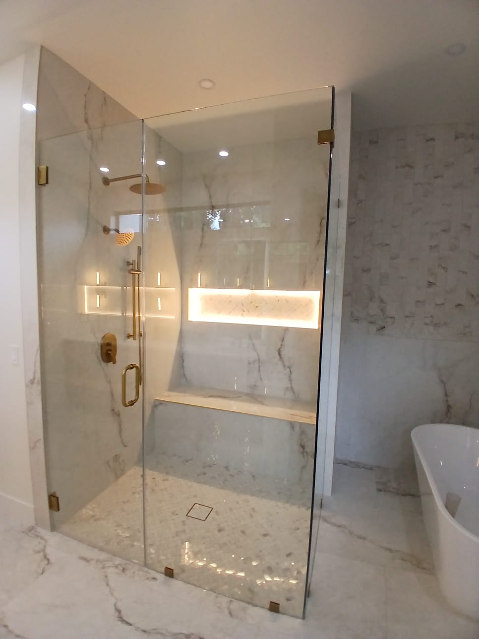 Frameless glass marble shower finished